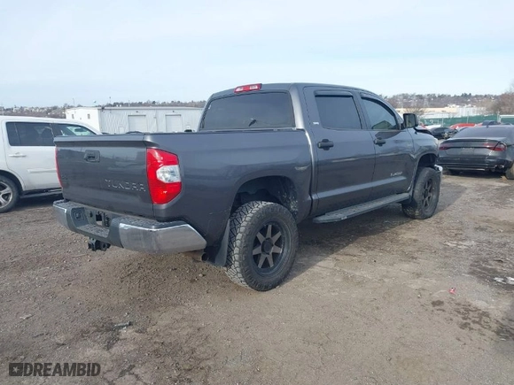 2018 Toyota Tundra 4WD SR5 with VIN 5TFDY5F14JX770184, listed as a IAAI auction lot 41303833 with 93,878 mi miles. Bid and sale history available at carsss.com. Image 4.