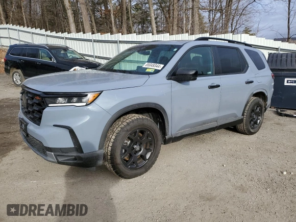 2024 Honda Pilot TrailSport with VIN 5FNYG1H69RB046728, listed as a Copart auction lot 85049344 with 8,573 mi miles and Salvage Title. Bid and sale history available at carsss.com. Image 1.