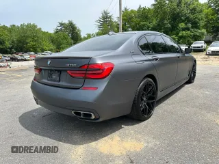 2018 BMW 7 Series M760i xDrive z VIN WBA7H6C54JG614931, wystawiony jako Copart lot #59110125 z przebiegiem 71 953 mil mil oraz Czysty tytuł • Clean title. Historia ofert i sprzedaży dostępna na DreamBid. Obrazek 3.