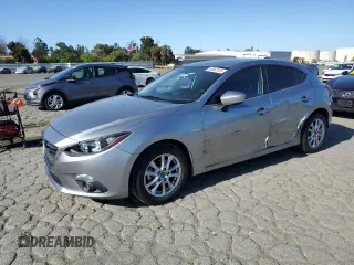 2015 Mazda 3 i Grand Touring z VIN JM1BM1M70F1260802, wystawiony jako Copart lot #60662705 z przebiegiem 89 974 mil mil oraz Szkoda całkowita • Salvage title. Historia ofert i sprzedaży dostępna na DreamBid. Obrazek 1.