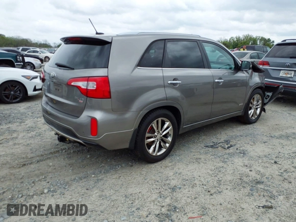 2014 Kia Sorento SX with VIN 5XYKWDA79EG440486, listed as a IAAI auction lot 41918486 with 167,288 mi miles and . Bid and sale history available at DreamBid. Image 4.