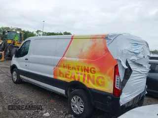 2020 Ford Transit Cargo with VIN 1FTBR1Y88LKB48985, listed as a IAAI auction lot 42009136 with 127,124 mi miles and . Bid and sale history available at DreamBid. Image 3.