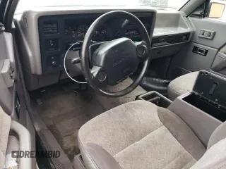 1996 Dodge Dakota z VIN 1B7GL23Y2TS561862, wystawiony jako Copart lot #72455804 z przebiegiem 110 601 mil mil oraz Szkoda całkowita • Salvage title. Historia ofert i sprzedaży dostępna na DreamBid. Obrazek 8.