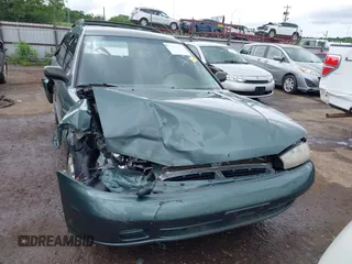 1996 Subaru Legacy L with VIN 4S3BK4356T7320808, listed as a IAAI auction lot 42308582 with 140,613 mi miles and . Bid and sale history available at DreamBid. Image 12.