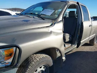 2007 Dodge 1500 ST with VIN 1D7HU18P07J602289, listed as a IAAI auction lot 41359159 with 177,716 mi miles and . Bid and sale history available at DreamBid. Image 6.