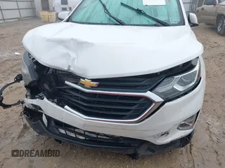 2019 Chevrolet Equinox LT z VIN 2GNAXUEVXK6254229, wystawiony jako IAAI lot #41649447 z przebiegiem 116 778 mil mil oraz . Historia ofert i sprzedaży dostępna na DreamBid. Obrazek 12.