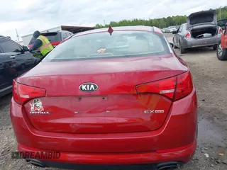 2013 Kia Optima EX z VIN 5XXGN4A78DG143138, wystawiony jako IAAI lot #41965486 z przebiegiem 73 795 mil mil oraz . Historia ofert i sprzedaży dostępna na DreamBid. Obrazek 17.