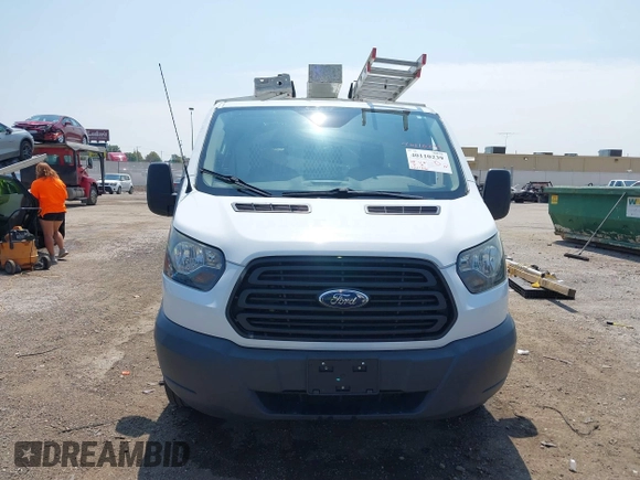 2016 Ford Transit Cargo with VIN 1FTYE1ZM1GKB27189, listed as a IAAI auction lot 40110239 with 131,106 mi miles and . Bid and sale history available at carsss.com. Image 12.