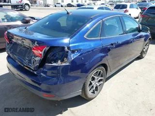 2017 Ford Focus SEL with VIN 1FADP3H21HL206514, listed as a IAAI auction lot 41864635 with 92,102 mi miles. Bid and sale history available at carsss.com. Image 4.
