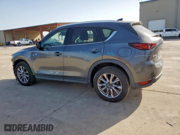 2019 Mazda CX-5 Grand Touring with VIN JM3KFADM8K1634011, listed as a Copart auction lot 57343455 with 67,138 mi miles and Salvage title. Bid and sale history available at DreamBid. Image 2.