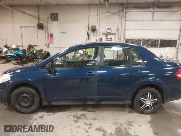 2009 Nissan Versa 1.8 S with VIN 3N1BC11E79L440560, listed as a IAAI auction lot 41975289 with 158,726 mi miles. Bid and sale history available at carsss.com. Image 12.