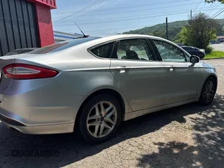 2014 Ford Fusion SE with VIN 3FA6P0HD3ER259110, listed as a Copart auction lot 55998455 with 270,539 mi miles and Clean Title. Bid and sale history available at DreamBid. Image 4.