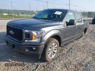 2018 Ford F-150 XL with VIN 1FTEW1EP9JFB24945, listed as a IAAI auction lot 42380592 with 132,895 mi miles and . Bid and sale history available at DreamBid. Image 2.