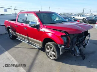 2019 Ford F-150 XL with VIN 1FTEW1C49KKE64825, listed as a IAAI auction lot 41561142 with 64,274 mi miles and . Bid and sale history available at DreamBid. Image 1.