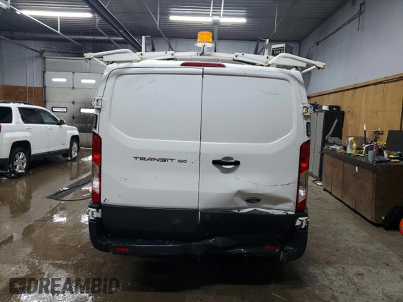 2015 Ford Transit Cargo with VIN 1FTNE1ZM0FKA59369, listed as a Copart auction lot 87335004 with 124,883 mi miles and Clean Title. Bid and sale history available at carsss.com. Image 6.