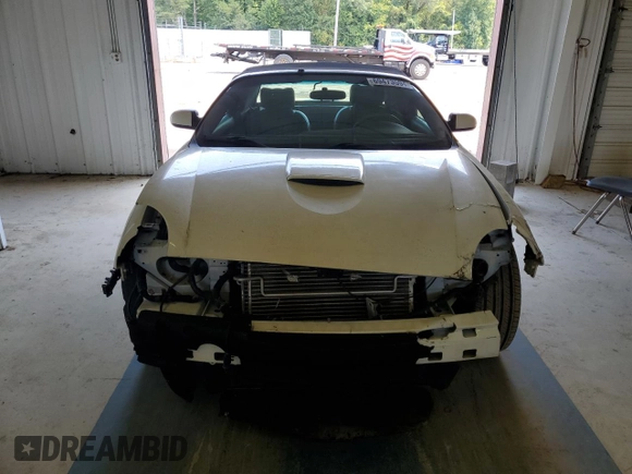 2002 Ford Thunderbird Hardtop Premium z VIN 1FAHP60A52Y130277, wystawiony jako Copart lot #69473594 z przebiegiem Nie podano mil oraz Szkoda całkowita • Salvage title. Historia ofert i sprzedaży dostępna na DreamBid. Obrazek 5.