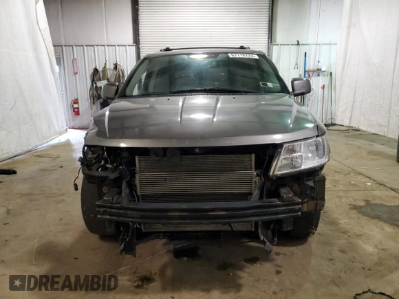 2013 Dodge Journey Crew with VIN 3C4PDCCG2DT706716, listed as a Copart auction lot 67118723 with 167,151 mi miles and Salvage title. Bid and sale history available at DreamBid. Image 5.