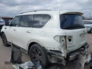2017 Nissan Armada Platinum with VIN JN8AY2NF0H9300641, listed as a IAAI auction lot 41527614 with 130,806 mi miles. Bid and sale history available at carsss.com. Image 3.