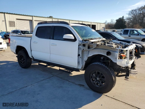 2019 Toyota Tacoma 4WD SR with VIN 3TMCZ5AN6KM204330, listed as a Copart auction lot 84695484 with NaN miles and Salvage Title. Bid and sale history available at carsss.com. Image 4.