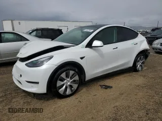 2023 Tesla Model Y Long Range z VIN 7SAYGAEE0PF693613, wystawiony jako Copart lot #54452895 z przebiegiem 19 574 mil mil oraz Szkoda całkowita • Salvage title. Historia ofert i sprzedaży dostępna na DreamBid. Obrazek 1.