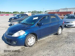 2010 Nissan Versa 1.8 S with VIN 3N1BC1APXAL374513, listed as a IAAI auction lot 42050825 with 262,600 mi miles. Bid and sale history available at carsss.com. Image 2.