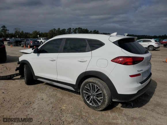 2020 Hyundai Tucson Sport with VIN KM8J33ALXLU093849, listed as a Copart auction lot 82670704 with 87,584 mi miles and Clean Title. Bid and sale history available at carsss.com. Image 2.