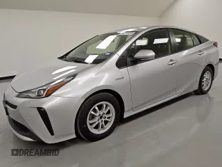 2021 Toyota Prius L Eco с VIN JTDKAMFU0M3140335, выставлен на аукционе Copart как лот 61955845 с пробегом 96 071 миль миль и Чистый • Clean title. История ставок и продаж доступна на DreamBid. Изображение 1.