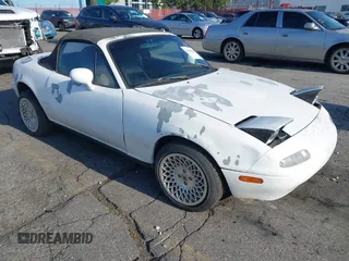 1993 Mazda MX-5 Miata with VIN JM1NA3511P0407132, listed as a IAAI auction lot 42141156 with 235,268 mi miles and . Bid and sale history available at DreamBid. Image 1.