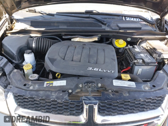 2018 Dodge Grand Caravan SXT with VIN 2C4RDGCG7JR203374, listed as a IAAI auction lot 41664694 with 113,332 mi miles and . Bid and sale history available at DreamBid. Image 10.
