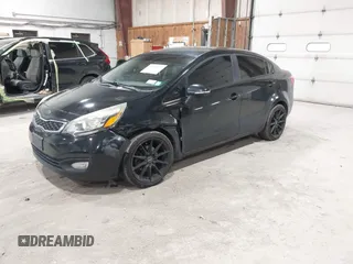 2013 Kia Rio SX with VIN KNADN4A38D6229948, listed as a IAAI auction lot 42007877 with 126,695 mi miles. Bid and sale history available at carsss.com. Image 2.
