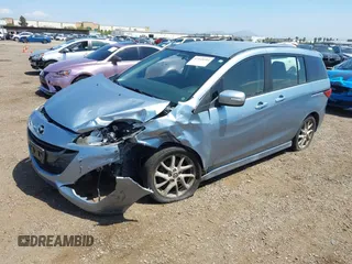 2013 Mazda 5 Touring with VIN JM1CW2CL8D0145628, listed as a IAAI auction lot 42148184 with 137,150 mi miles and . Bid and sale history available at DreamBid. Image 17.