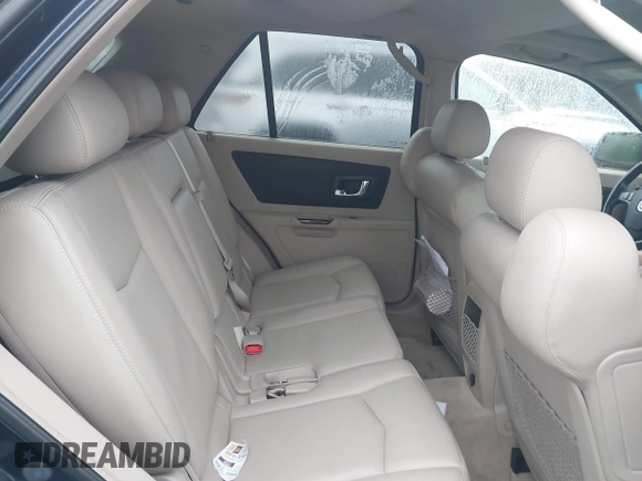 2005 Cadillac SRX with VIN 1GYEE63A650152302, listed as a IAAI auction lot 42010138 with 101,831 mi miles. Bid and sale history available at carsss.com. Image 8.