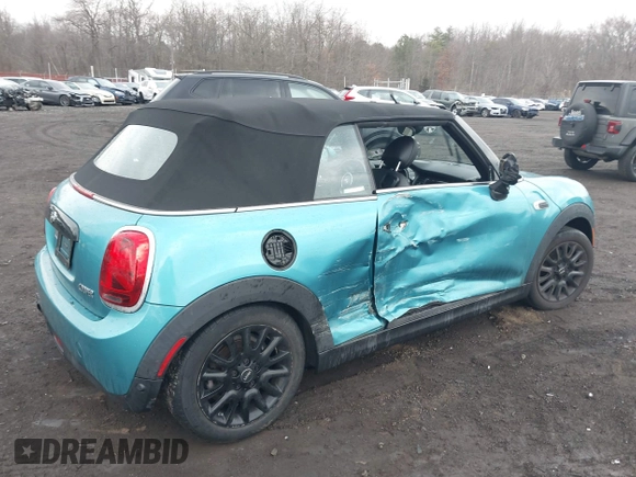 2019 MINI Convertible Cooper with VIN WMWWG5C52K3H08648, listed as a IAAI auction lot 41686314 with 40,728 mi miles and . Bid and sale history available at DreamBid. Image 6.