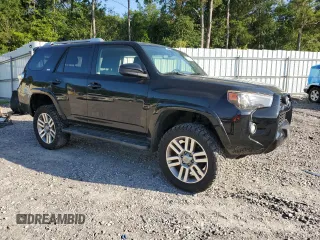 2014 Toyota 4Runner Limited with VIN JTEBU5JR1E5183406, listed as a Copart auction lot 60012235 with 131,220 mi miles and Salvage title. Bid and sale history available at DreamBid. Image 4.