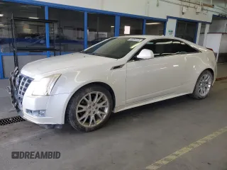2014 Cadillac CTS Performance with VIN 1G6DC1E38E0120656, listed as a Copart auction lot 56563295 with 124,997 mi miles and Salvage title. Bid and sale history available at DreamBid. Image 1.