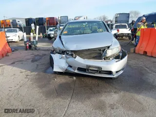 2010 Honda Civic Sdn LX with VIN 19XFA1F55AE071252, listed as a IAAI auction lot 39065549 with 142,676 mi miles. Bid and sale history available at carsss.com. Image 13.