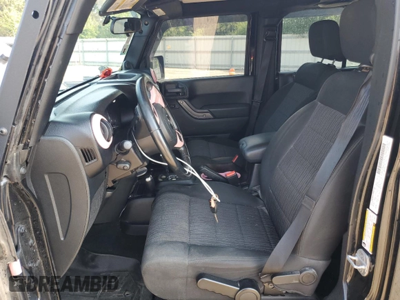2012 Jeep Wrangler Unlimited Sport with VIN 1C4BJWDG8CL116811, listed as a Copart auction lot 59372085 with 95,498 mi miles and Salvage title. Bid and sale history available at DreamBid. Image 7.