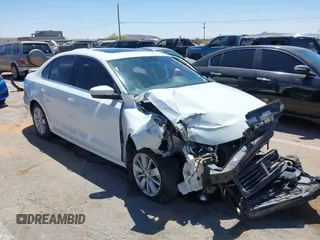 2015 Volkswagen Jetta SE z VIN 3VWD07AJ5FM346565, wystawiony jako IAAI lot #42104880 z przebiegiem 93 491 mil mil oraz . Historia ofert i sprzedaży dostępna na DreamBid. Obrazek 6.