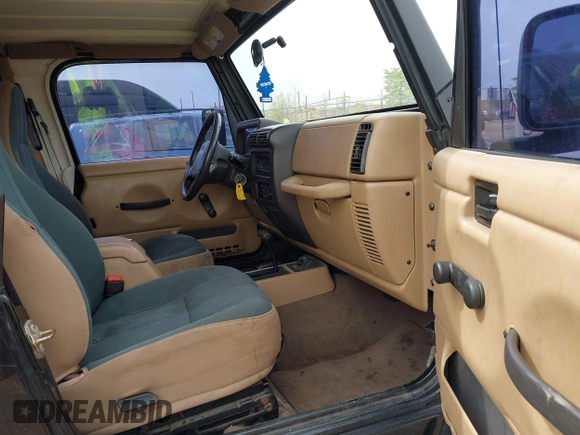 2001 Jeep Wrangler Sahara with VIN 1J4FA59S81P321733, listed as a IAAI auction lot 42164863 with 174,509 mi miles. Bid and sale history available at carsss.com. Image 5.