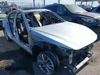 2019 Infiniti Q50 3.0t LUXE with VIN JN1EV7AP1KM516989, listed as a IAAI auction lot 39728303 with 1 mi miles. Bid and sale history available at carsss.com. Image 1.