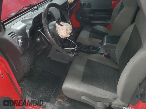 2008 Jeep Wrangler X with VIN 1J4FA24118L501599, listed as a Copart auction lot 52776475 with 74,186 mi miles and Salvage Title. Bid and sale history available at DreamBid. Image 7.