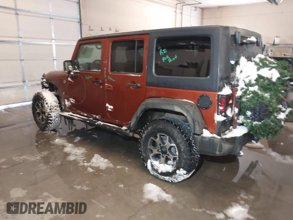 2014 Jeep Wrangler Unlimited Sport with VIN 1C4BJWDG6EL194569, listed as a IAAI auction lot 41549268 with 122,740 mi miles. Bid and sale history available at carsss.com. Image 3.