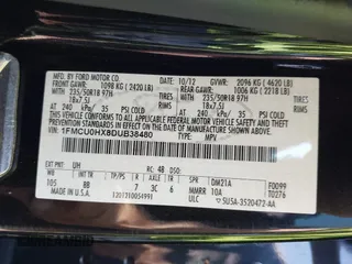 2013 Ford Escape SEL with VIN 1FMCU0HX8DUB38480, listed as a IAAI auction lot 42176271 with 154,309 mi miles. Bid and sale history available at carsss.com. Image 9.