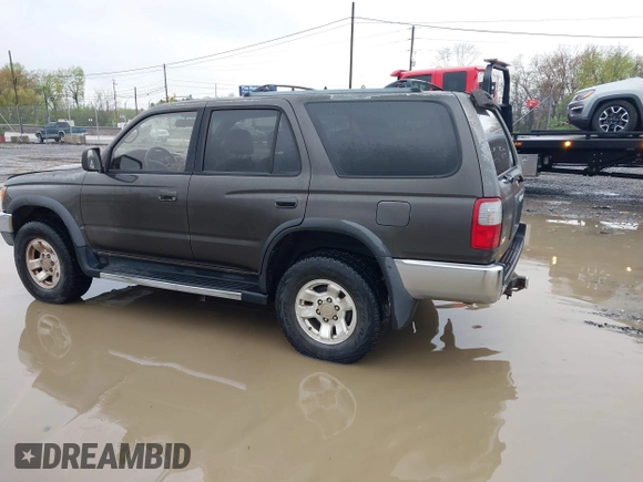 1998 Toyota 4Runner SR5 with VIN JT3HN86R1W0168185, listed as a IAAI auction lot 41936469 with 243,983 mi miles and . Bid and sale history available at DreamBid. Image 3.