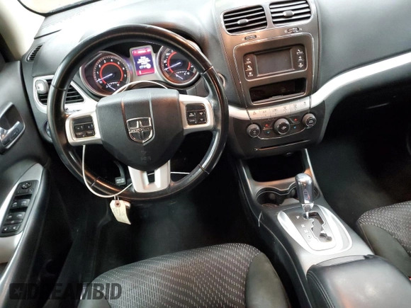 2012 Dodge Journey SXT с VIN 3C4PDCCG4CT133946, выставлен на аукционе Copart как лот 77002184 с пробегом 118 985 миль миль и Чистый • Clean title. История ставок и продаж доступна на DreamBid. Изображение 8.