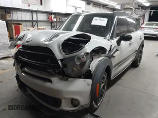 2015 MINI Countryman S with VIN WMWZC5C53FWT37722, listed as a IAAI auction lot 42151891 with 110,488 mi miles and . Bid and sale history available at DreamBid. Image 17.