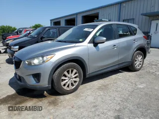 2014 Mazda CX-5 Sport with VIN JM3KE2BE7E0334880, listed as a Copart auction lot 61780635 with 96,926 mi miles and Salvage title. Bid and sale history available at DreamBid. Image 1.
