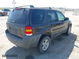 2007 Ford Escape XLT with VIN 1FMYU03167KA10635, listed as a IAAI auction lot 42009859 with 1 mi miles. Bid and sale history available at carsss.com. Image 4.