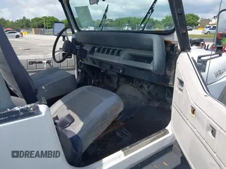 1990 Jeep Wrangler with VIN 2J4FY29T7LJ528844, listed as a IAAI auction lot 42354175 with 69,349 mi miles and . Bid and sale history available at DreamBid. Image 5.