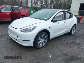 2020 Tesla Model Y Long Range with VIN 5YJYGDEE4LF044843, listed as a IAAI auction lot 41799504 with 40,770 mi miles and . Bid and sale history available at DreamBid. Image 19.